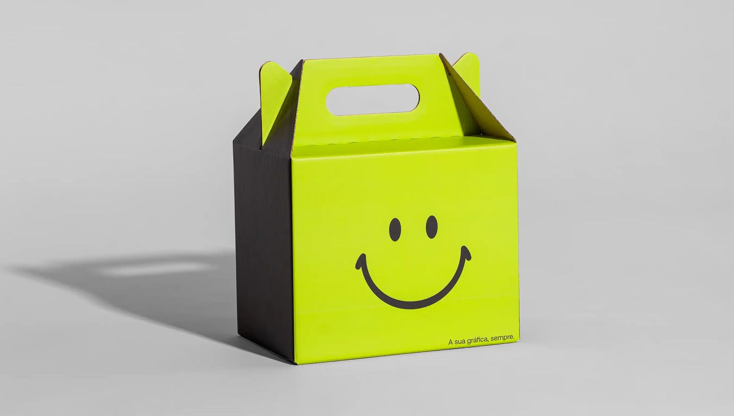 Embalagem maleta transporte na cor verde e com estampa de smile