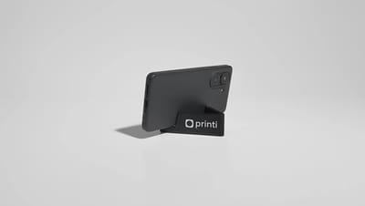 Porta celular de mesa personalizado na cor preta com celular.