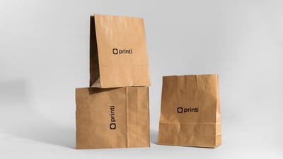  Três sacos de papel kraft personalizados com a marca Printi